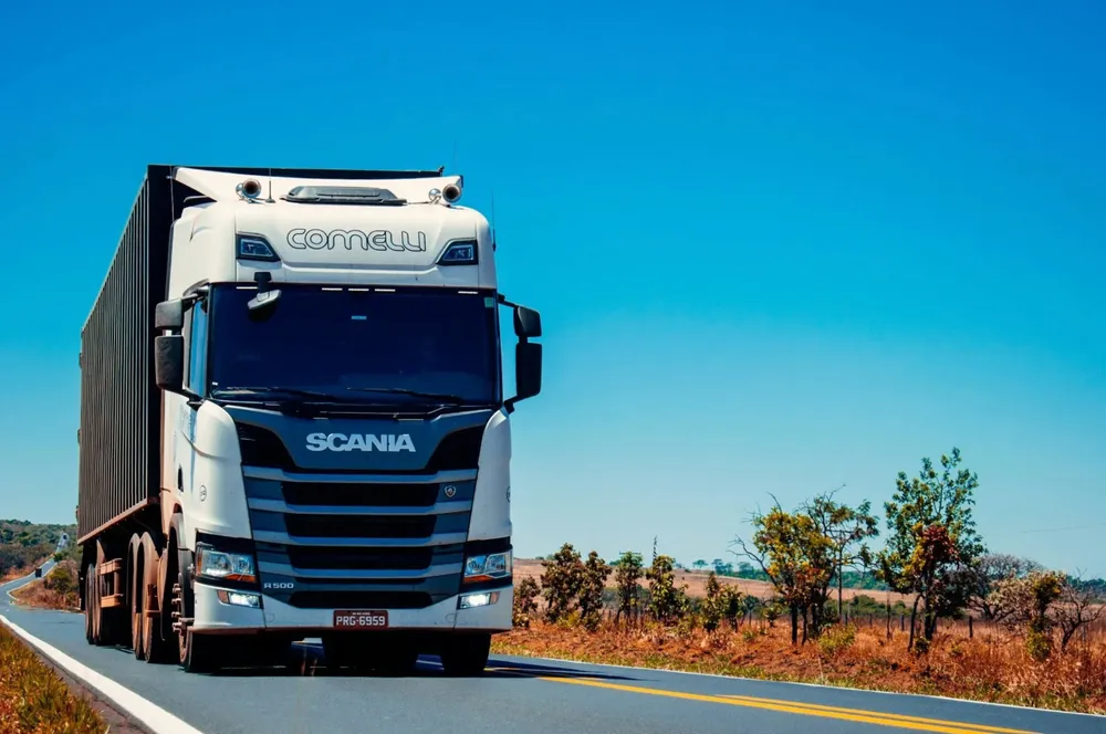 A tractor unit on a long-haul lane carrying APS pallets